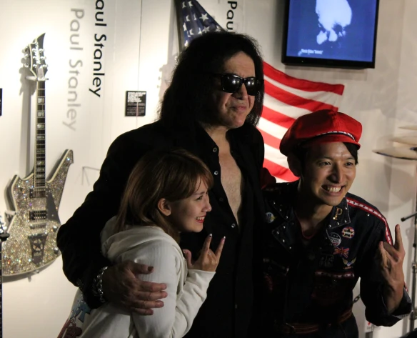 Gene Simmons posing with Japanese TV stars at the KISS Expo in Tokyo, Photo: Stefan Nilsson